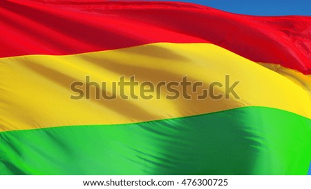 Bolivia flag waving against clean blue sky, close up, isolated with clipping mask alpha channel transparency