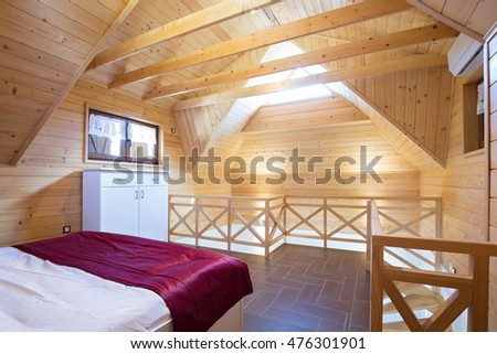 Interior of a holiday apartment bedroom in the attic