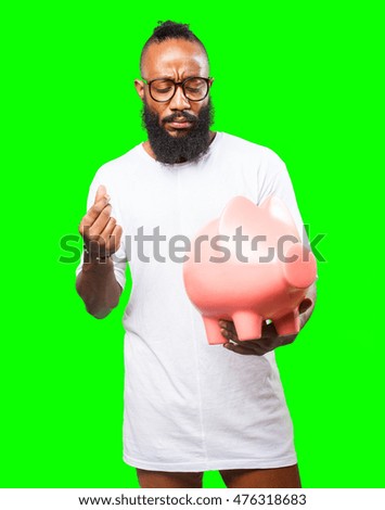 black man saving with a piggy bank