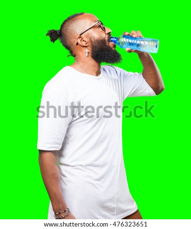 black man drinking water