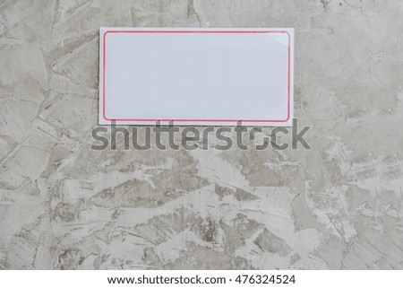 blank signboard on concrete wall
