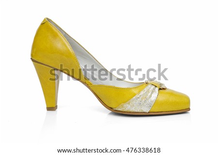 yellow leather shoe isolated on a white, 