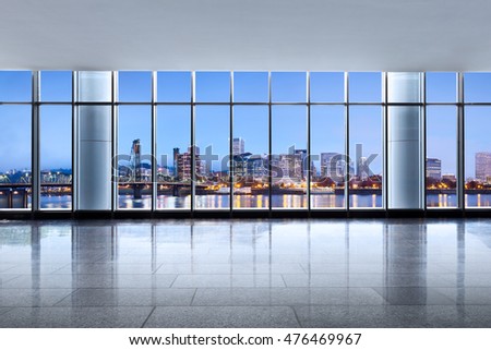 cityscape and skyline of portland at sunrise from glass window