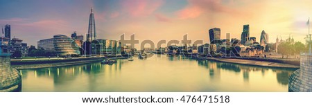 London panoramic toned image from Tower Bridge at sunrise