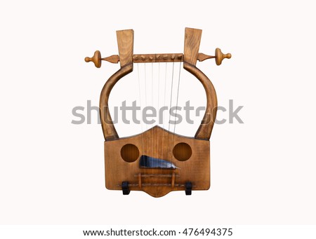 Greek musical instrument lyra isolated over white Royalty-Free Stock Photo #476494375