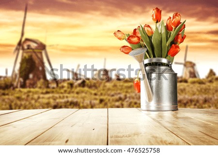 autumn background of wooden table and sunset time 