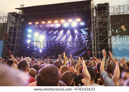 Crowd at a open air concert Royalty-Free Stock Photo #476542633