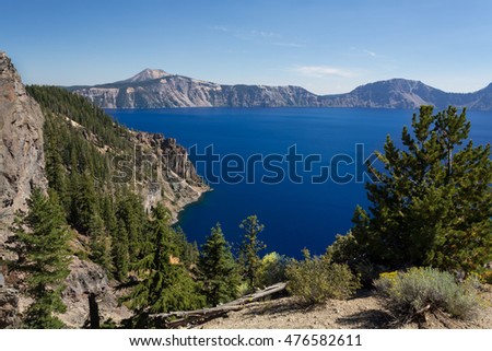 Beautiful view at Crater lake shores from above. Crater Lake National Park in Oregon, USA