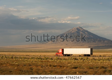 Delivery truck moving on Interstate 80 in Nevada, USA Royalty-Free Stock Photo #47662567