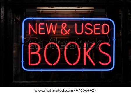Neon sign that says, "NEW & USED BOOKS"