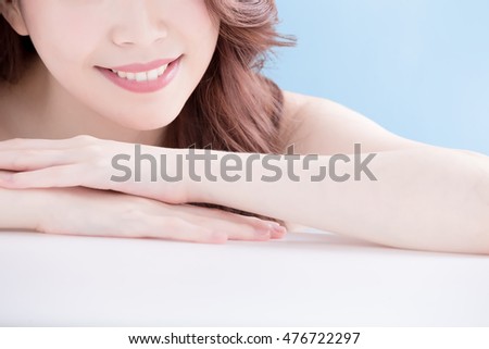 beauty skin care woman lying on the white table with blue background,  asian