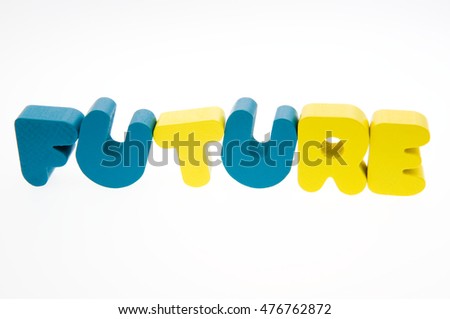 Wooden letters spelling the word  "future"  on white background. 