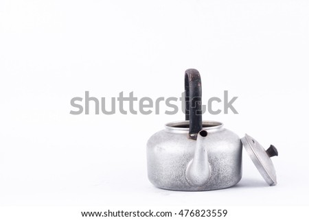 old vintage retro Kettle on white background drink isolated ( still life). Which, kettle made of aluminum materials.
