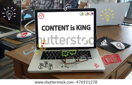 drawing icon cartoon with CONTENT IS KING   concept on laptop in the office , business technology