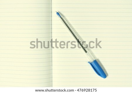 Blank paper with blue pen