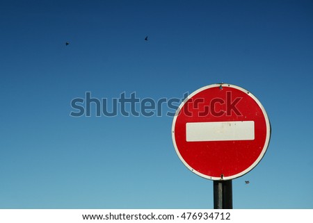 Road sign against a blue sky in Russia