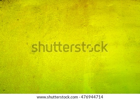 yellow green metal plate with vertical diagonal dark scratch background. Metal color wall with dark abrasion marks texture. High quality resolution metal steel vintage plate with some old scratch