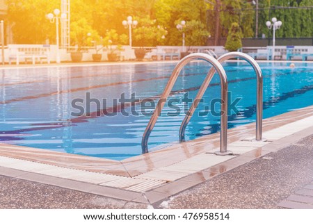 swimming pool with stair at sport center.
