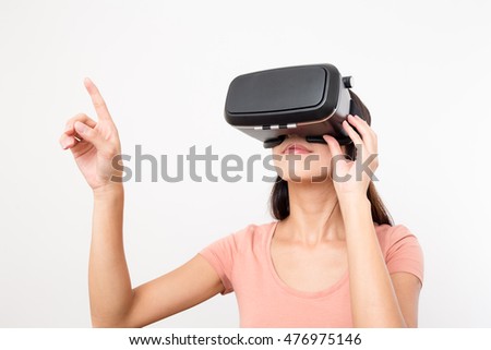 Young woman watching movie with virtual reality