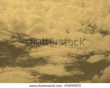 sky with white clouds useful as a background vintage sepia