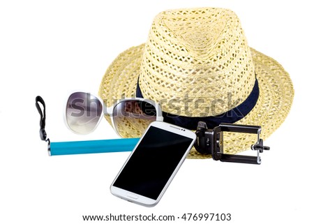 straw hat with sunglasses and smartphone and equipment selfie  background / Handmade straw hat on white background.