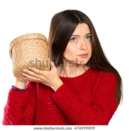 Young beautiful woman opening a wooden box