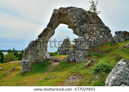  Rock with hole. Eastern cost of Gothland island, Sweden