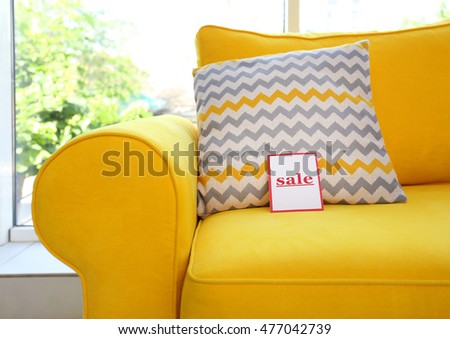 Modern yellow couch for sale in furniture store