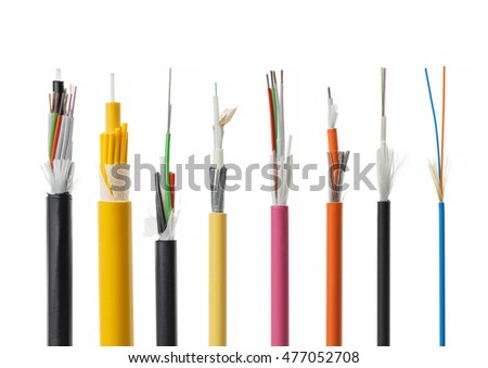 Collection of fiber optical cables isolated on white background. Loose tubes with optical fibres and central strenght member including waterblocking glass yarn and ripcord, multimode or single mode Royalty-Free Stock Photo #477052708