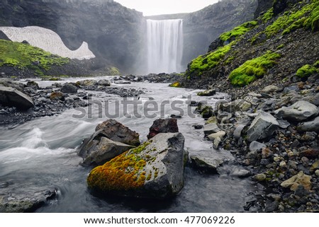 Beautiful vibrant panorama picture with a view on icelandic waterfall
