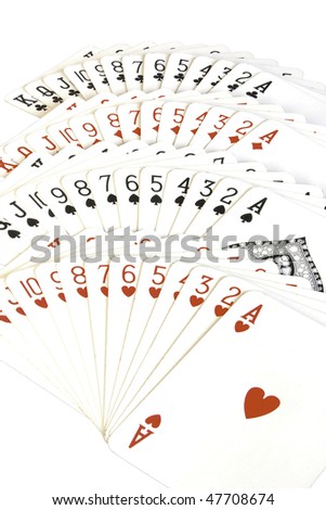 Deck of playing cards, isolated on green table background