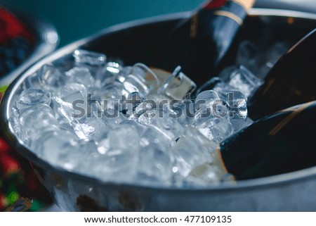 A concept of luxury life with champagne bottle in ice bucket