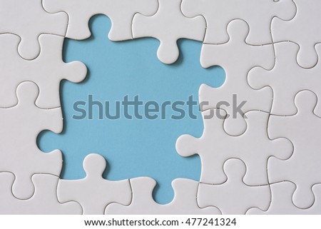 Jigsaw puzzle on a blue background
