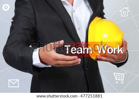 Text the word team work on the hands of the businessman, Business concept.