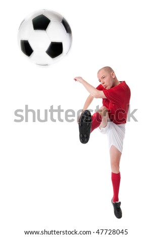 Full isolated studio picture from a young soccer player with ball