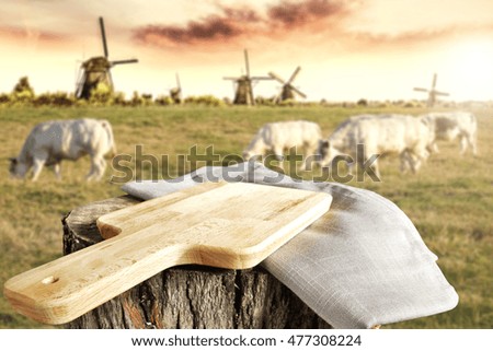 background of cows and wind mill with free space for your decoration 