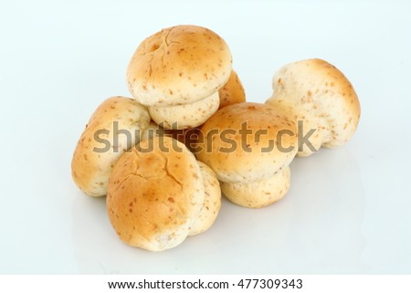 Whole wheat and grains with breads. Mushroom form.