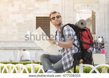Tourists looking around and map reading in Istanbul
