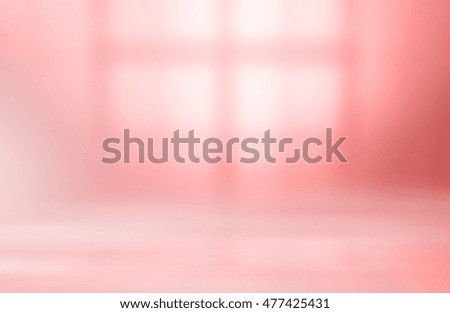 Blurred Lights from windows to room filtered pink tones.