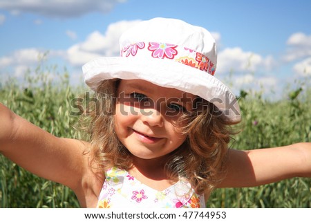 Little girl in white hat