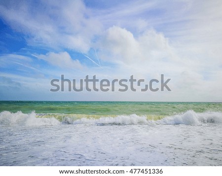 beautiful clear sea with little wave on the beach