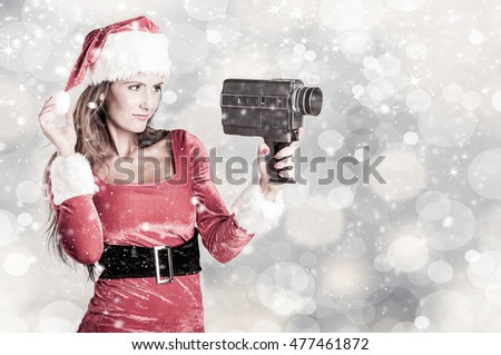 Santa girl with a retro camera 8mm