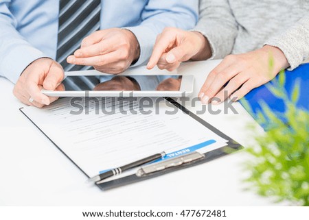 business meeting executive consulting review career report tablet - stock image