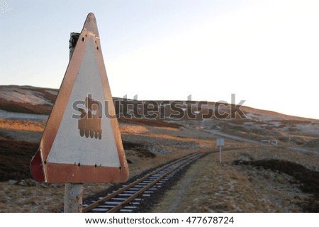 winter railroad signage