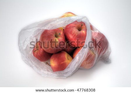 A Plastic Bag of Gala Apples Isolated on White Royalty-Free Stock Photo #47768308