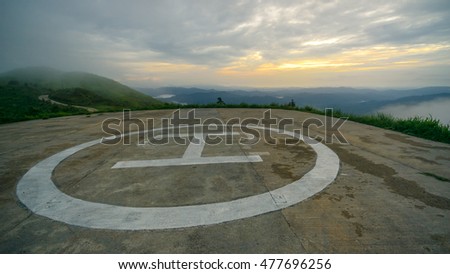 Helipad on the  mountain view in the rain
