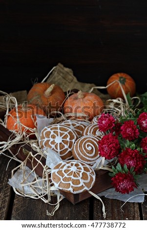 Pumpkin cookies with aster flower bouquet