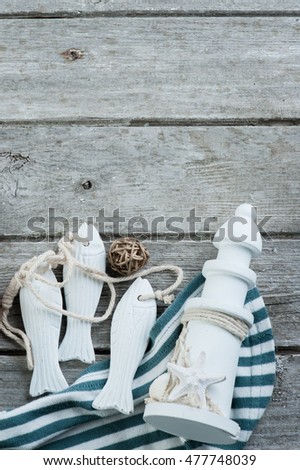 Marine items on old wooden background. Toned image. Place for text. 
