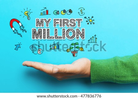 My First Million concept with hand on blue background