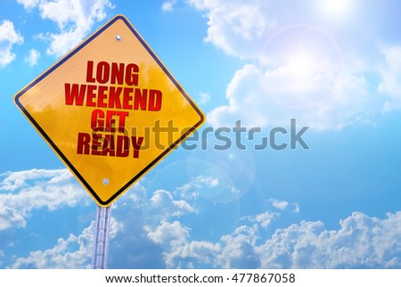 long weekend get ready word on yellow traffic sign blue sky background